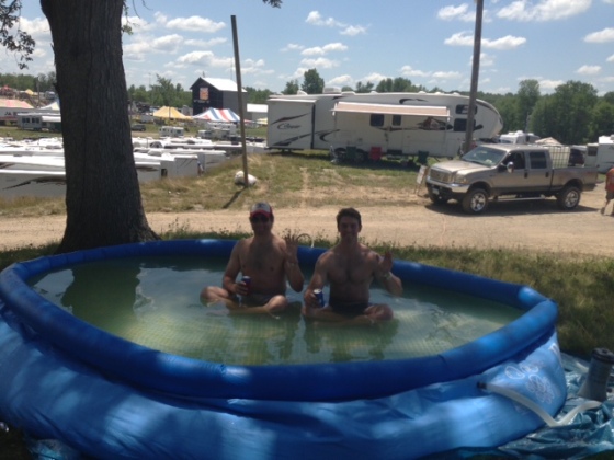 Kevin and Mike sitting in my pool! We filled it with well water, which quickly turned an awkward shade of brown. I think the Porta Kleen team drained it because it looked rancid...