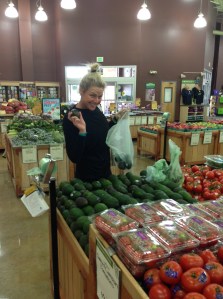 Jen picking out assorted organic produce 